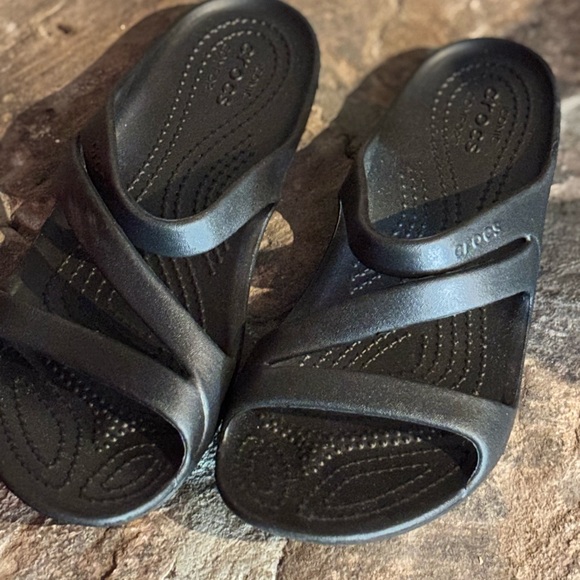 Black Slide Sandals by crocs - Picture 1 of 3